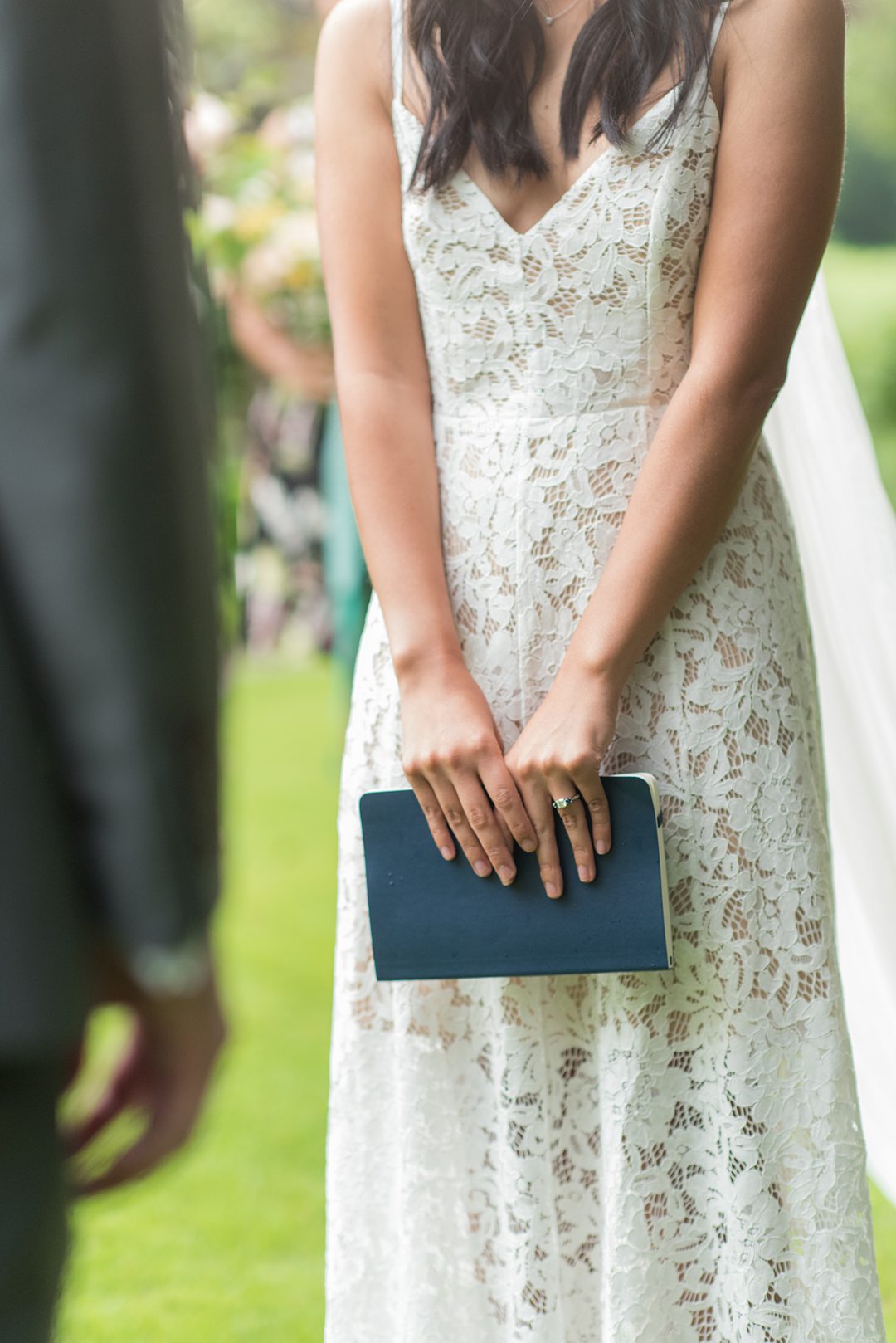 The bride wrote her own vows for her small outdoor wedding ceremony in a flower-filled park in Raleigh, NC captured by Mikkel Paige Photography. #mikkelpaige #raleighweddings #smallwedding #ncelopement