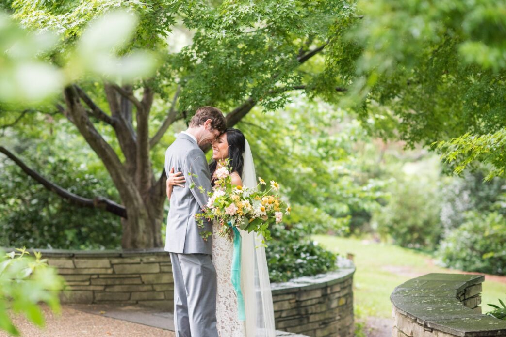 Small wedding ceremony outside in Raleigh, NC as the couple pivoted from a postponement due to COVID. Photos by Mikkel Paige Photography.