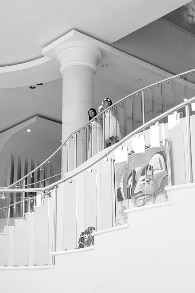 The flower girls look on at a wedding in Jamaica at Iberostar resort.