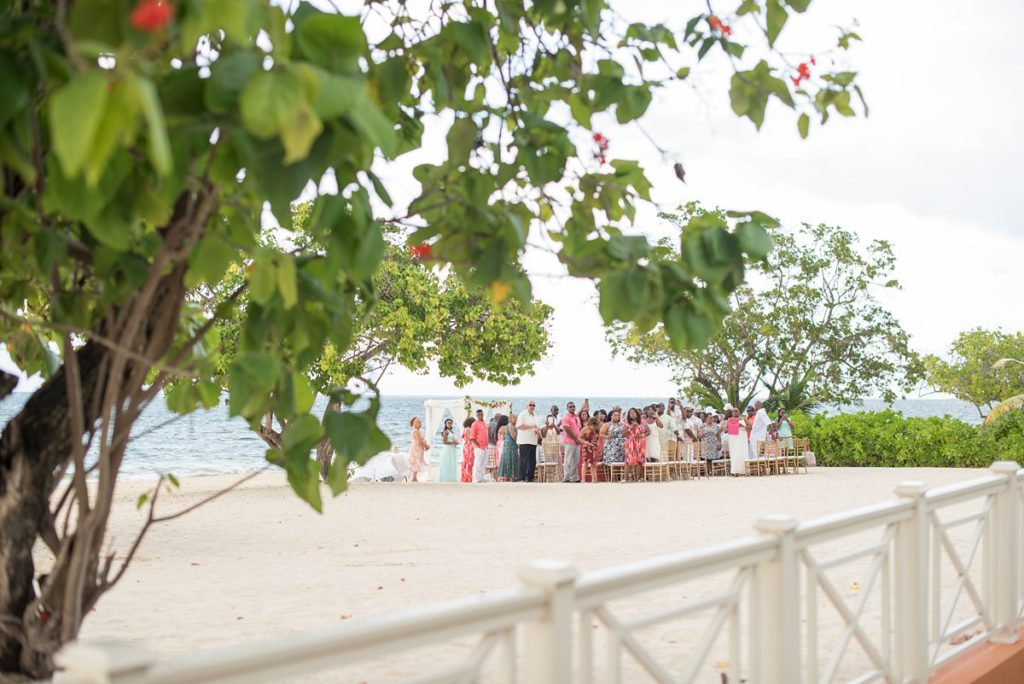 Jamaica wedding photographer at Iberostar resort with an oceanfront ceremony.
