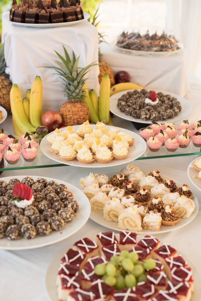 Jamaica wedding photographer at Iberostar resort with an oceanfront reception and food options.