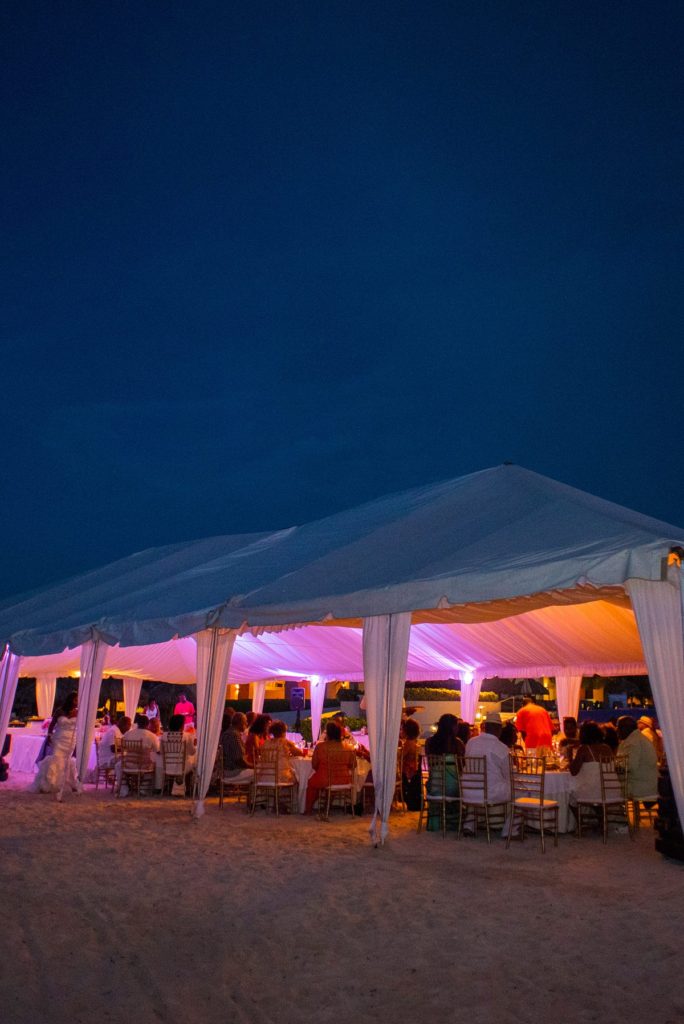 Evening tent on the beach at a wedding in Jamaica, photographed by Mikkel Paige Photography.