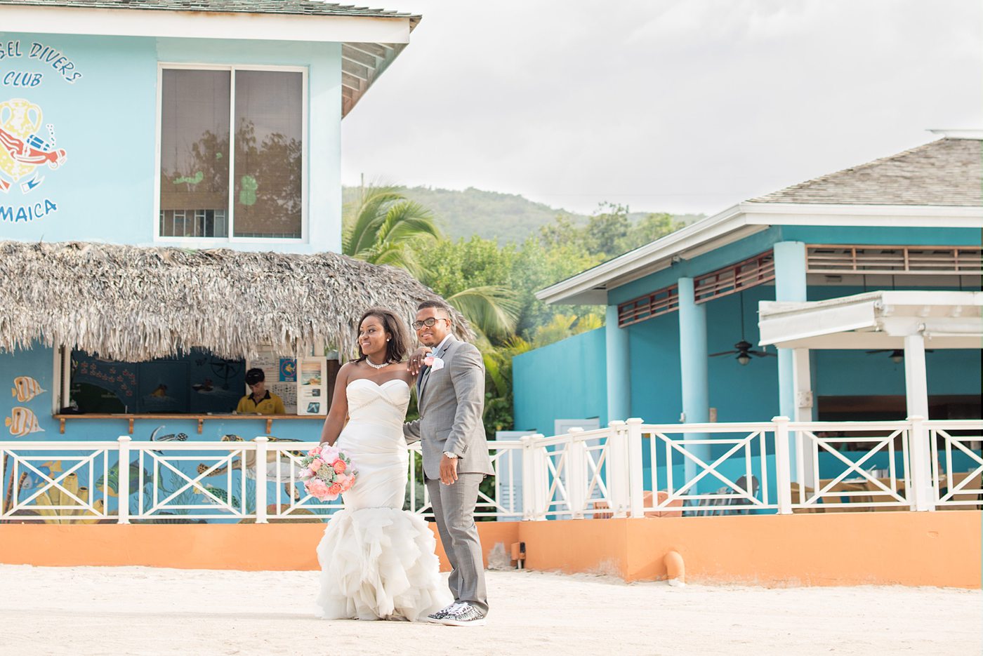 Jamaica wedding photographer at Iberostar resort with a bride in the sand.
