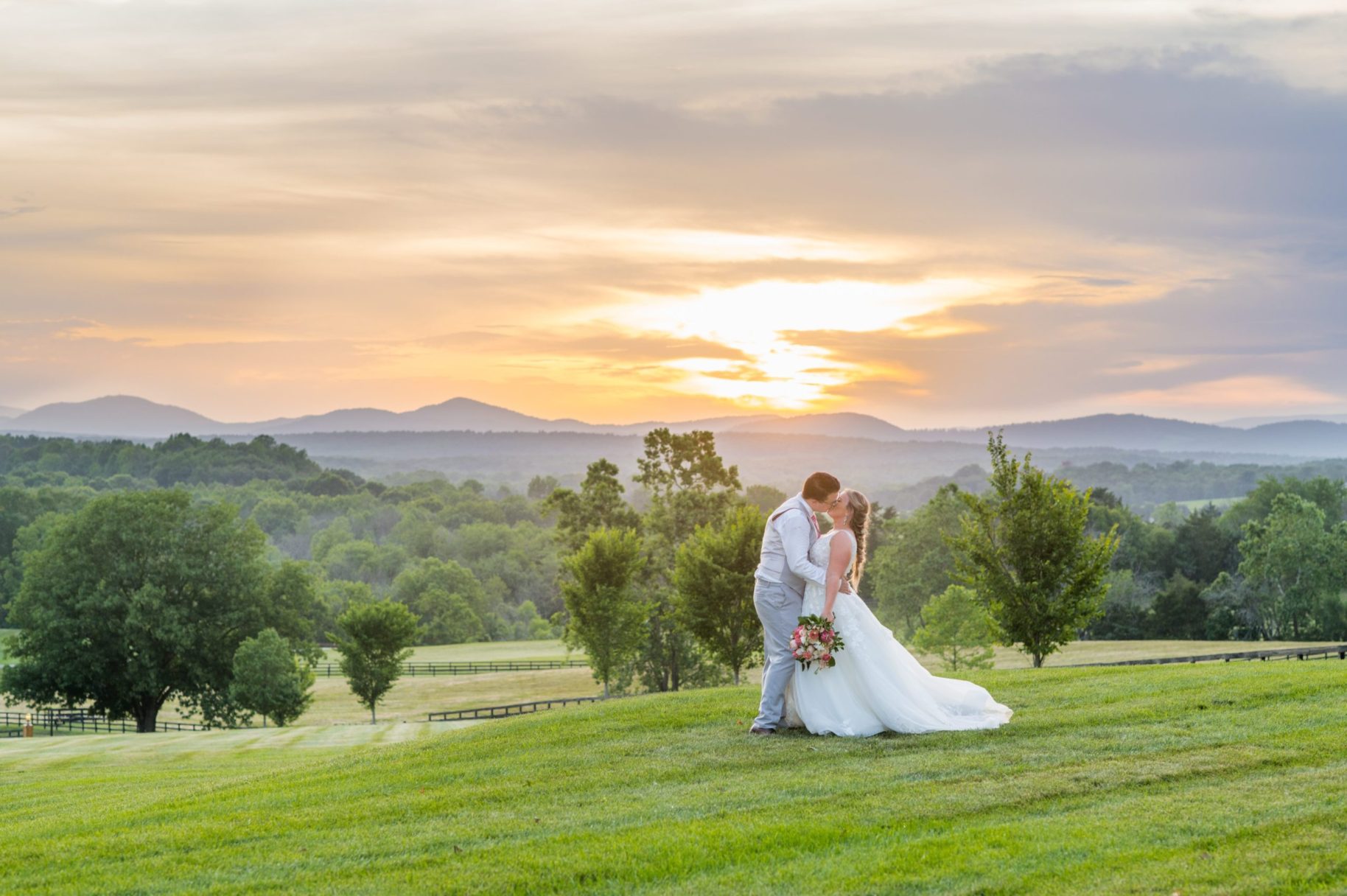 Sunset photo at the Lodge at Mount Ida farm with the bride and groom by Mikkel Paige Photography. #charlottesvillewedding #mikkelpaige #sunsetphotos #brideandgroom