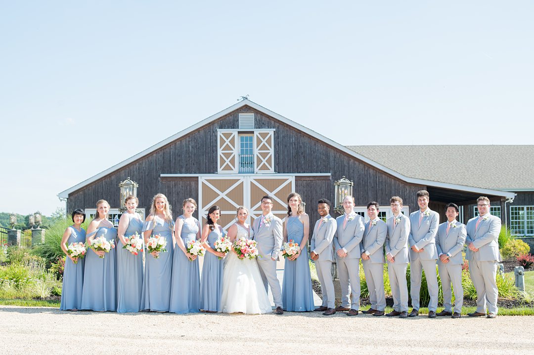 Bridal party in blue gowns for a small wedding in Charlottesville Virginia. Photos by Mikkel Paige Photography at the Lodge at Mount Ida Farm. #mikkelpaige #bridalparty #mountidafarm #charlottesvillewedding