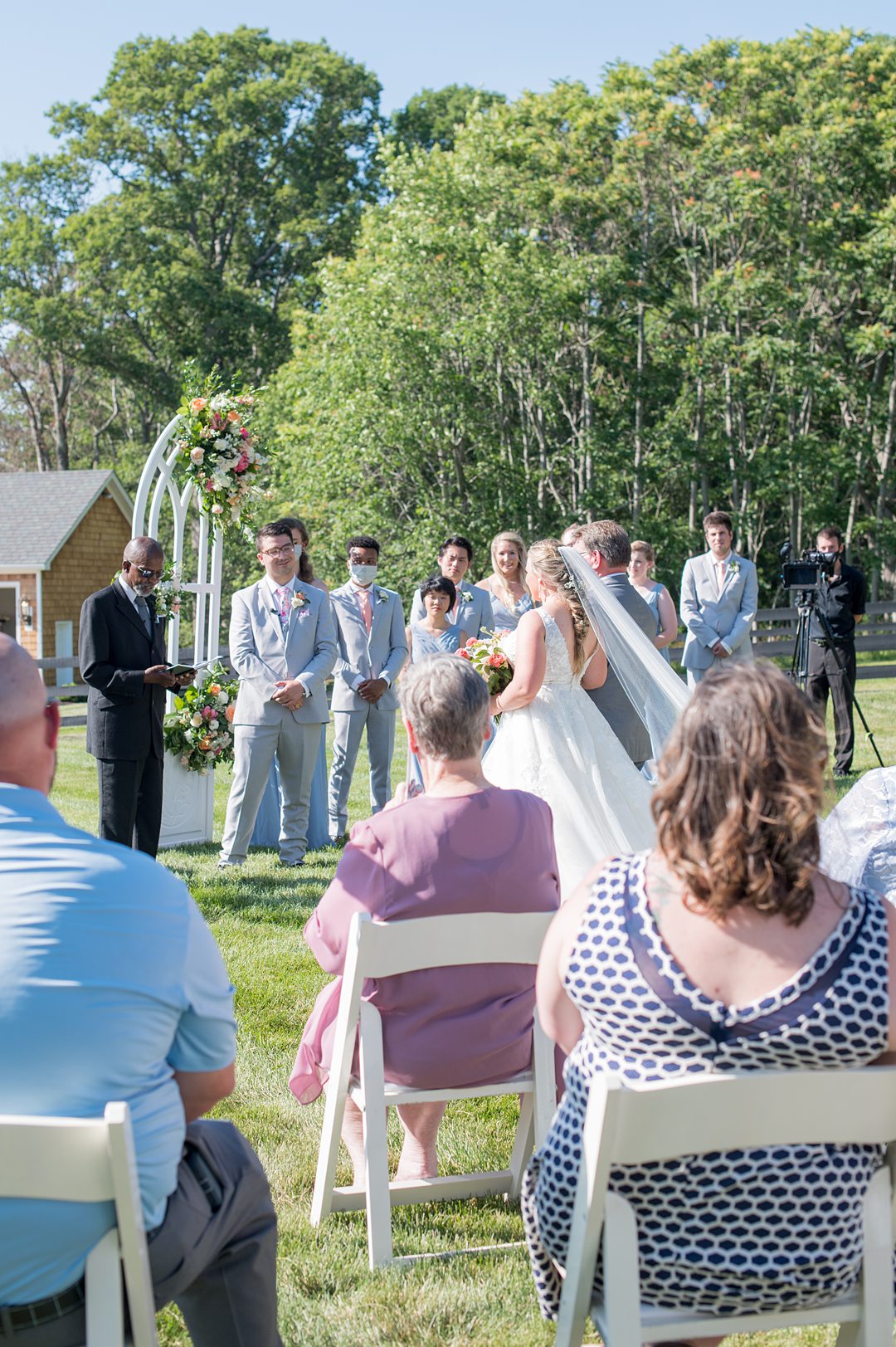 Socially distanced ceremony overlooking the Blue Ridge Mountains at the Lodge at Mount Ida Farm. Photos by Mikkel Paige Photography. #mikkelpaige #smallwedding #charlottesvillewedding