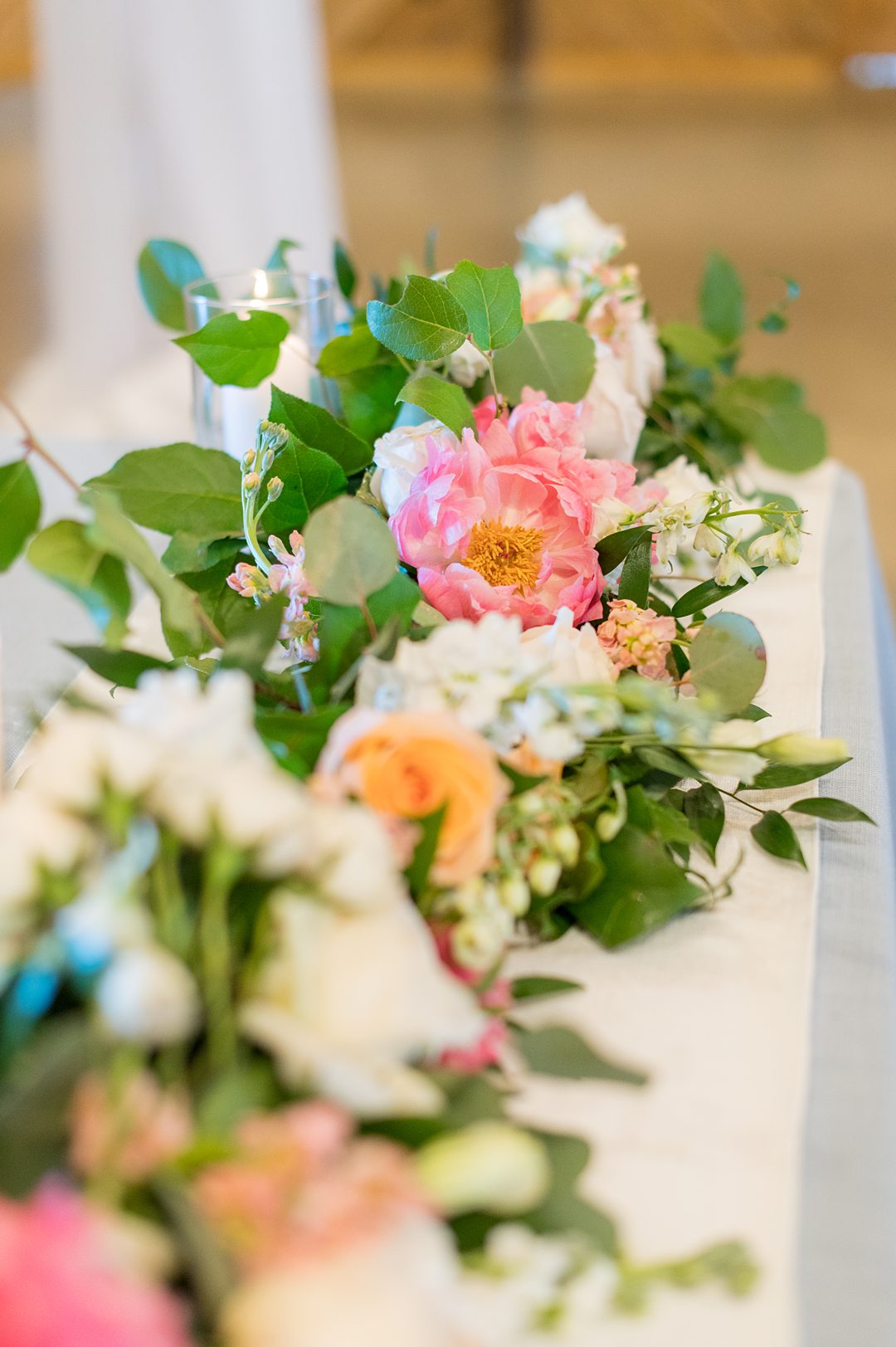 Photos of the table flowers taken by Mikkel Paige Photography for a summer wedding at The Lodge at Mount Ida farm. #peonies #mikkelpaige #weddingreception #charlottesvillewedding