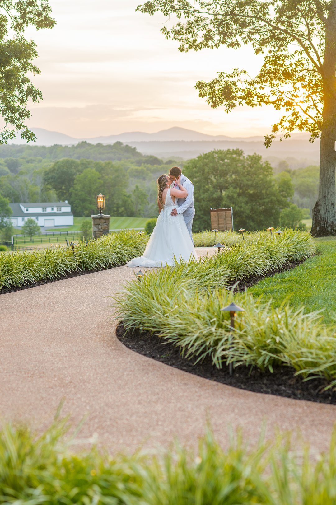 Sunset photo at the Lodge at Mount Ida farm with the bride and groom by Mikkel Paige Photography. #charlottesvillewedding #mikkelpaige #sunsetphotos #brideandgroom
