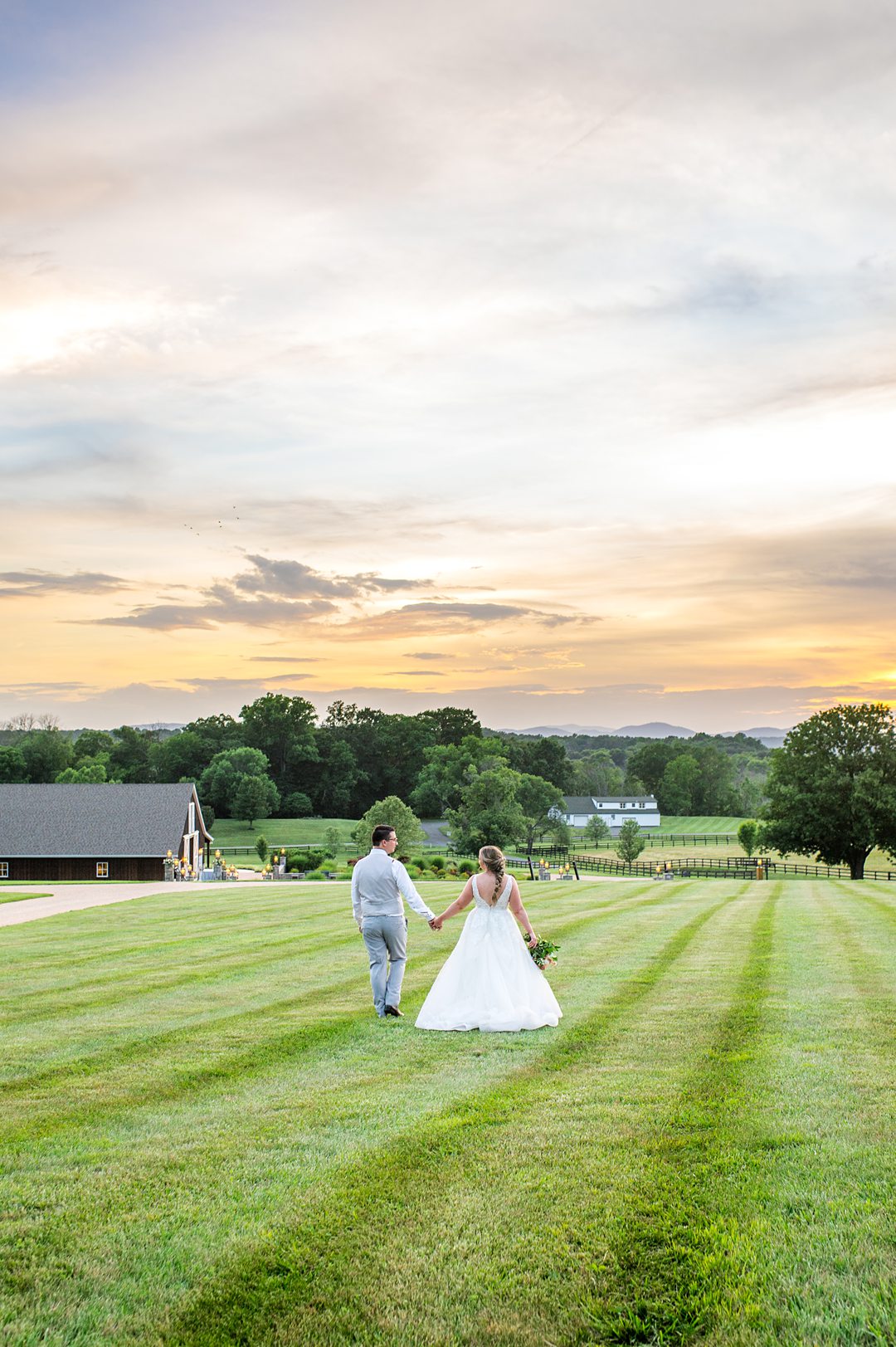 Sunset photo at the Lodge at Mount Ida farm with the bride and groom by Mikkel Paige Photography. #charlottesvillewedding #mikkelpaige #sunsetphotos #brideandgroom