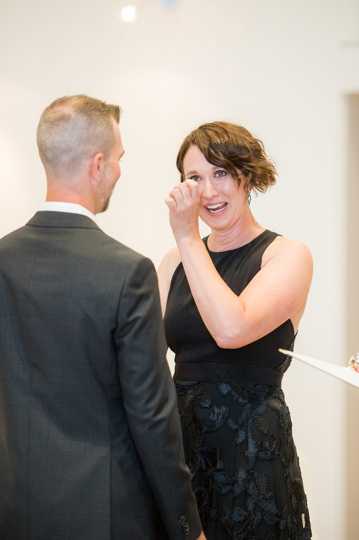 Bride crying during her wedding ceremony