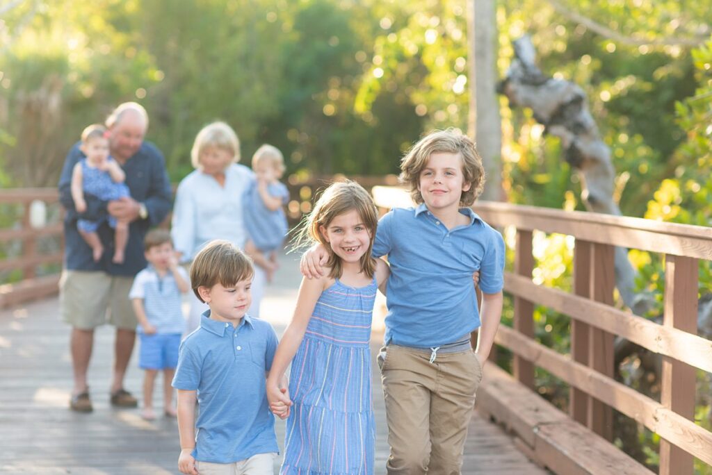 Family during golden hour on Marco Island, Florida on the Gulf Coast. Pictures by Mikkel Paige Photography.
