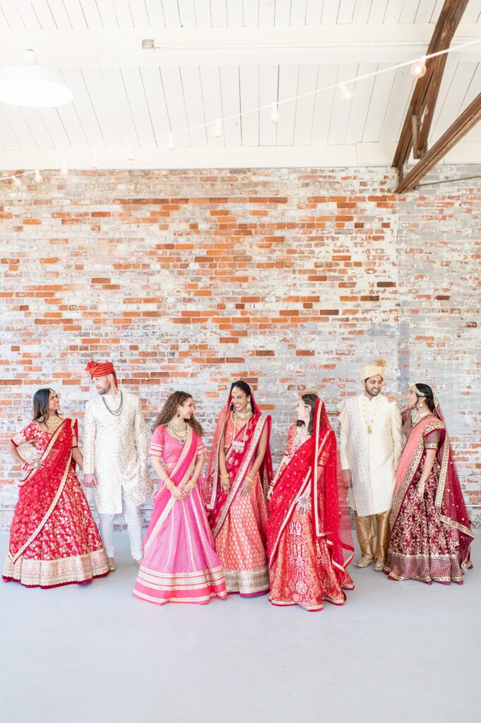 Indian wedding party in colorful attire in North Carolina.