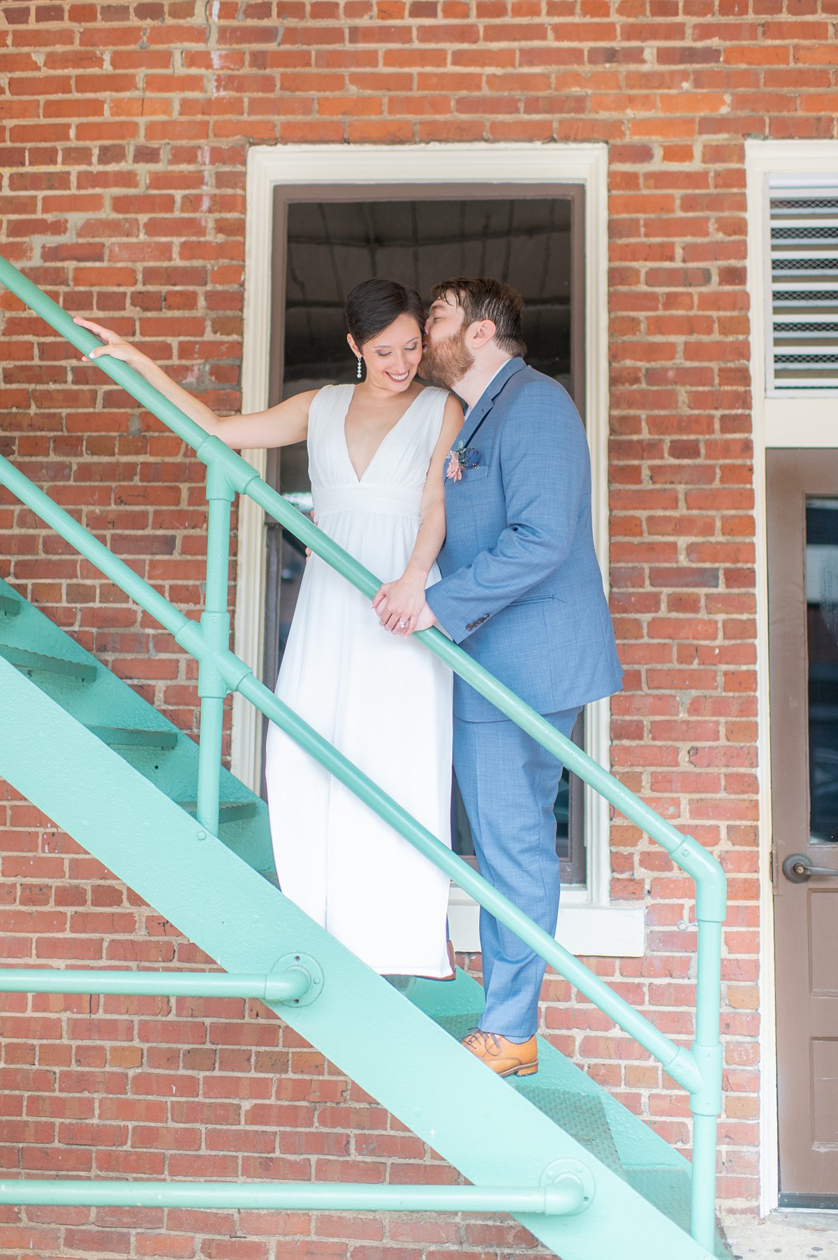 Downtown Raleigh wedding with colorful murals by Mikkel Paige Photography.