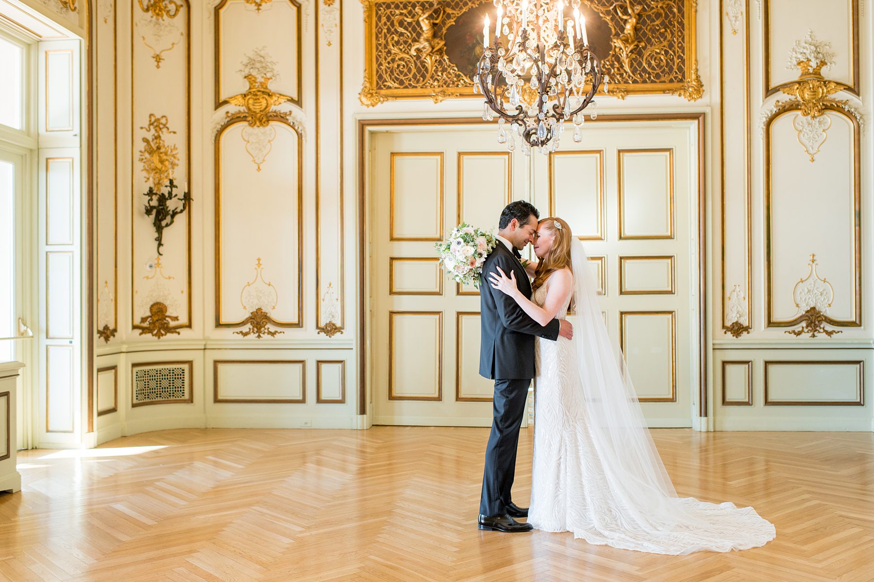 Bride and groom in the gold room of the historic Sleepy Hollow Country club for their September wedding day. 