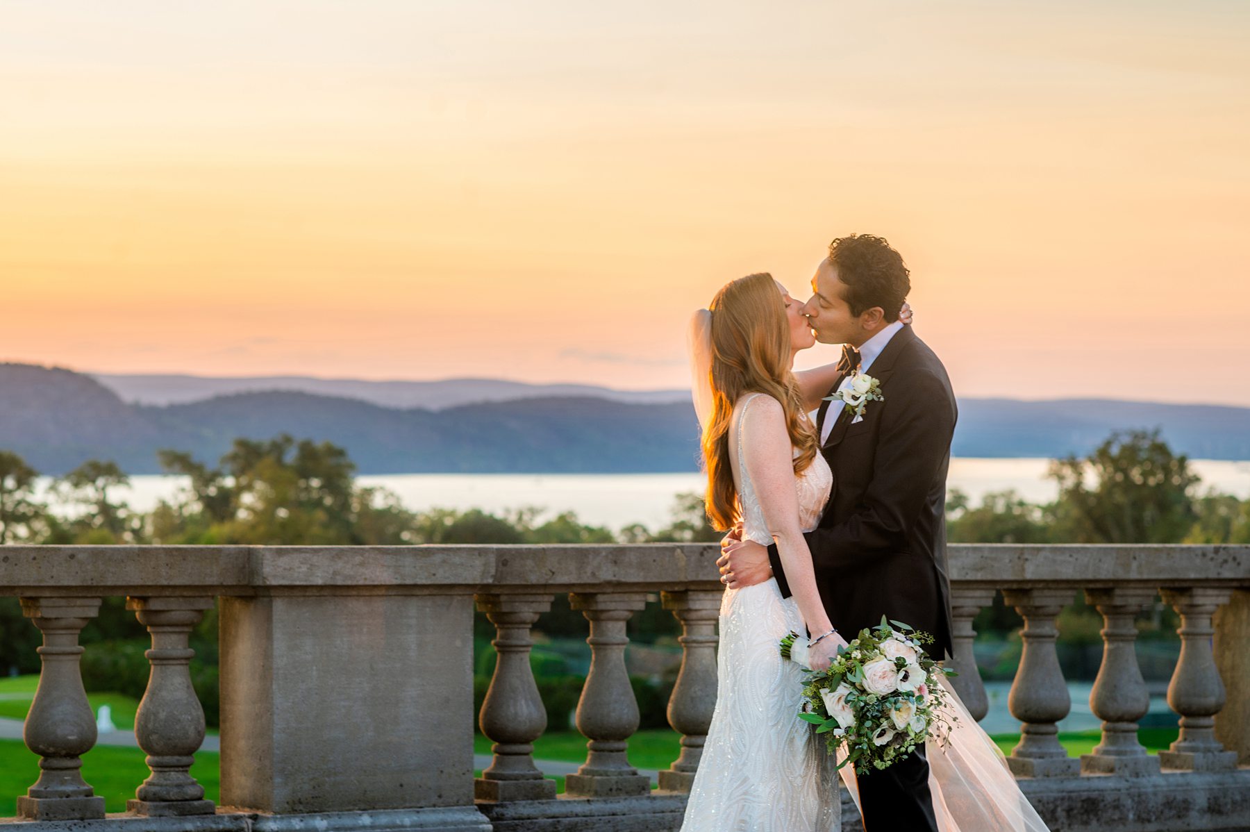 Sunset kiss for the bride and groom at their wedding in Sleepy Hollow, NY.