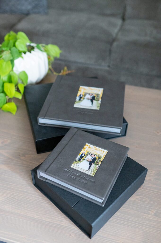 Grey leather wedding albums from The Umstead in Cary, NC by Mikkel Paige Photography.