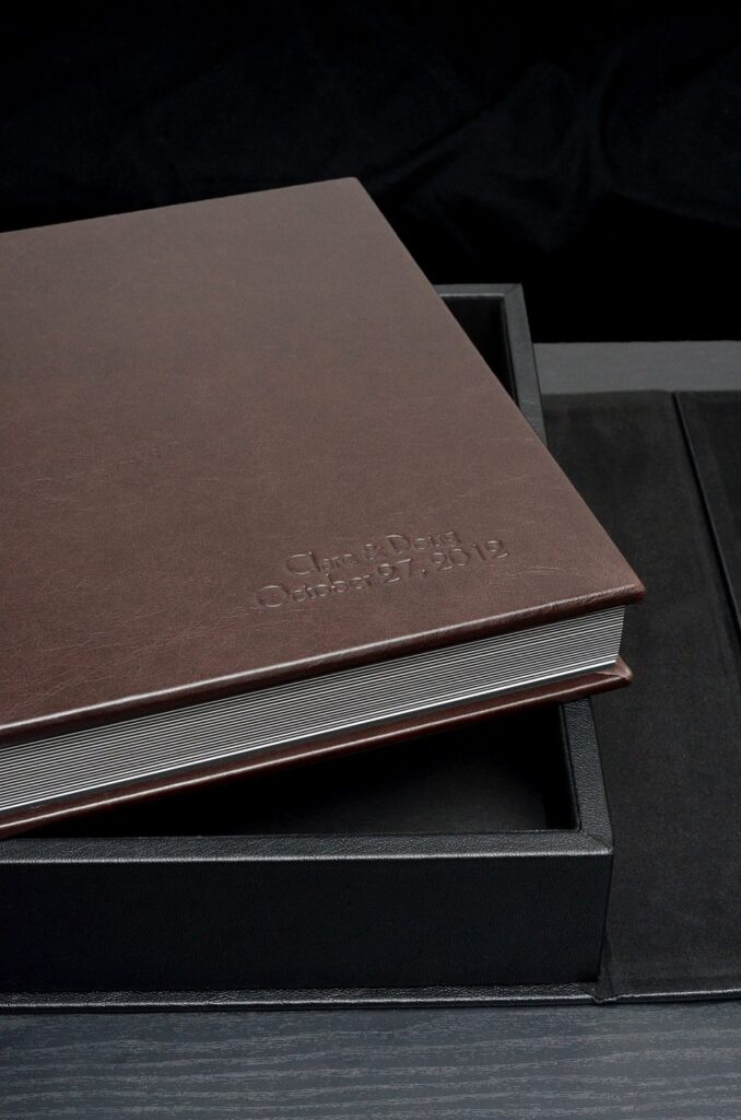 Brown leather wedding album by Mikkel Paige Photography.