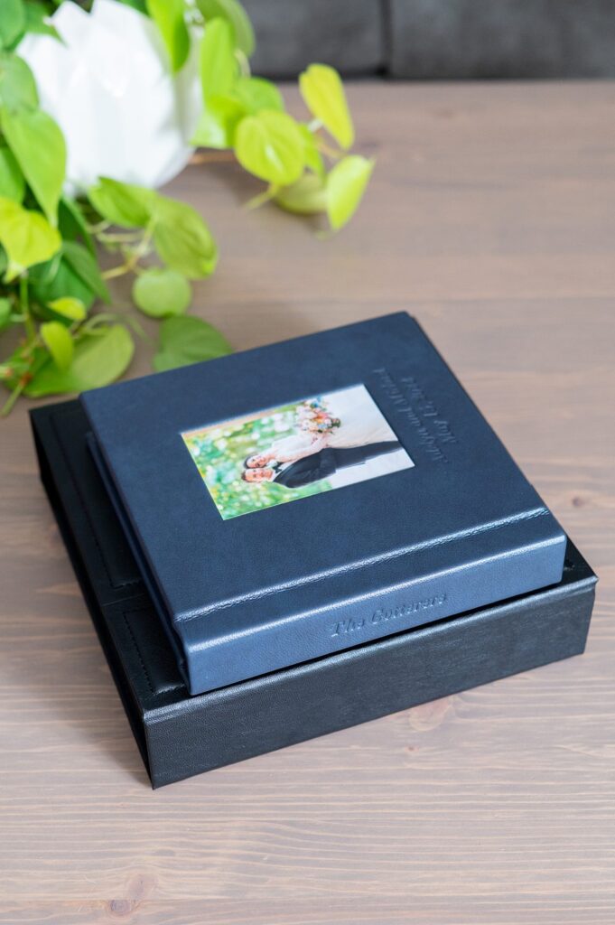 Navy blue leather wedding album by Mikkel Paige Photography.