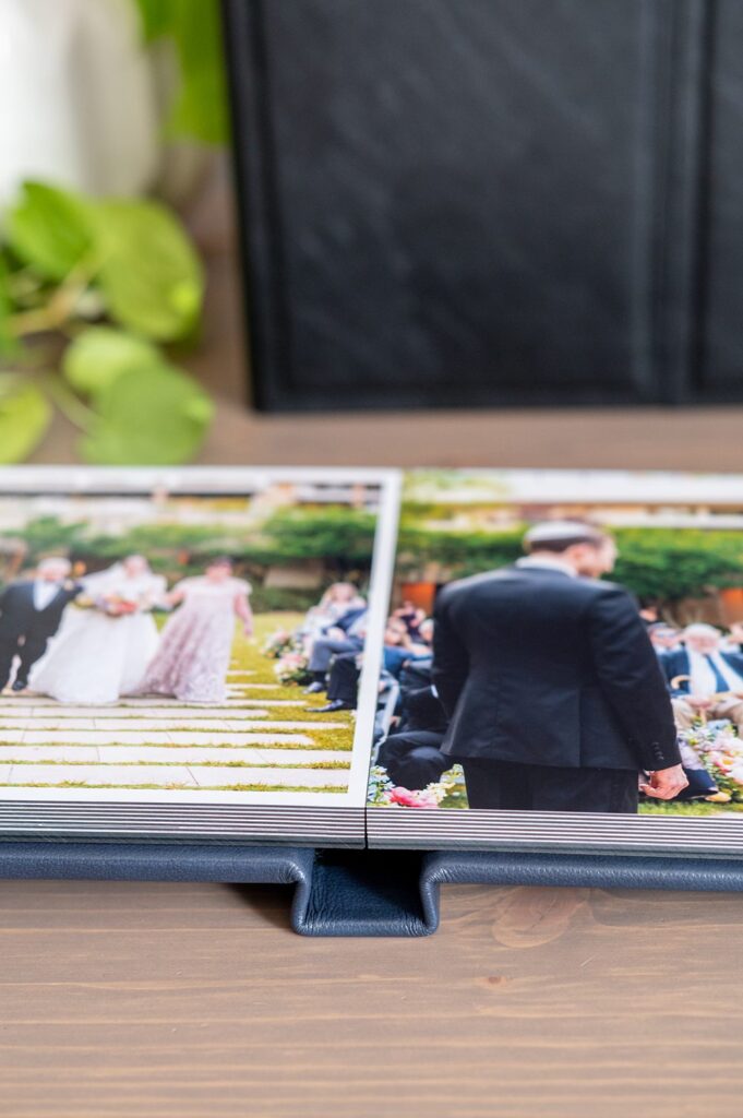 Navy blue leather wedding album by Mikkel Paige Photography.