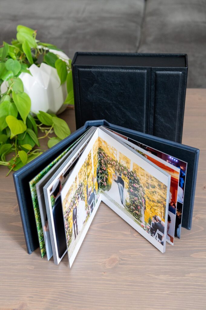 Navy blue leather wedding album by Mikkel Paige Photography.