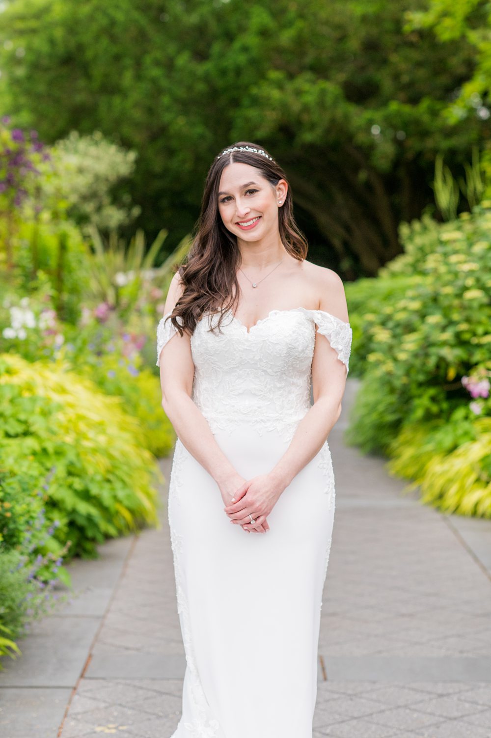 Bride in the perennial garden at New York Botanical Garden in NYC. Photos by Mikkel Paige Photography.