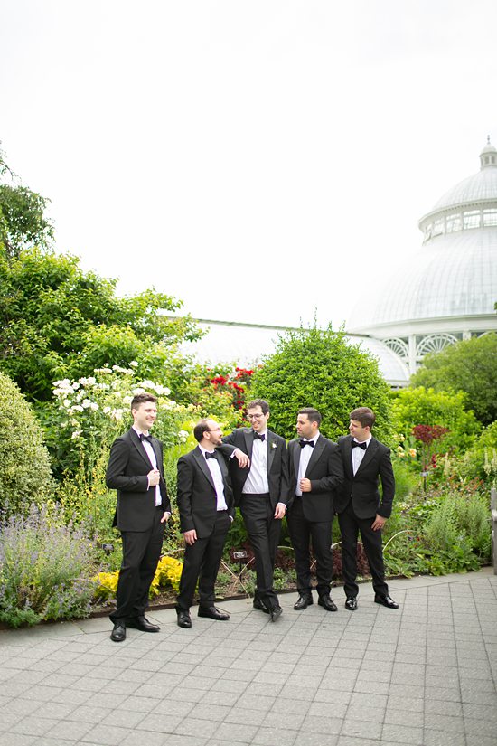 New York Botanical Garden photos by Mikkel Paige Photography, in NYC. Groomsmen dressed in black tuxedos.