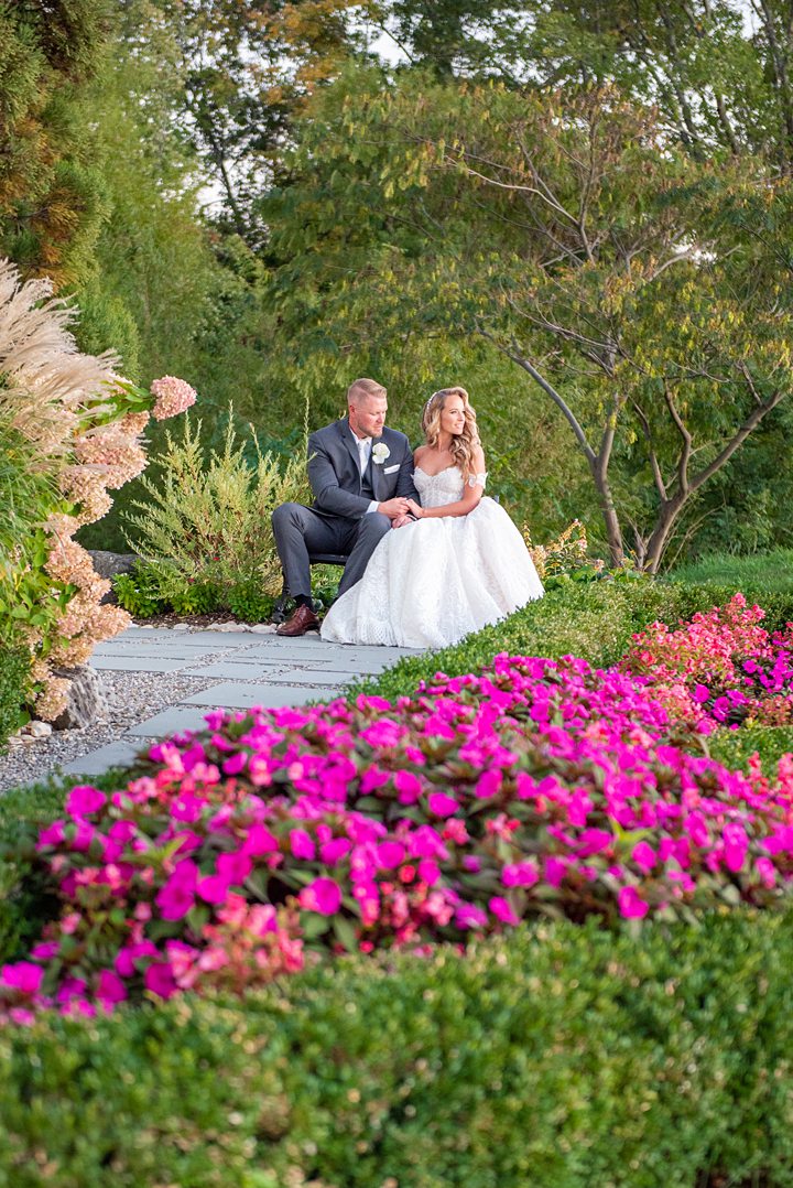 Bride and groom at their Mill at Spring Lake NJ wedding. Image by Mikkel Paige Photography.