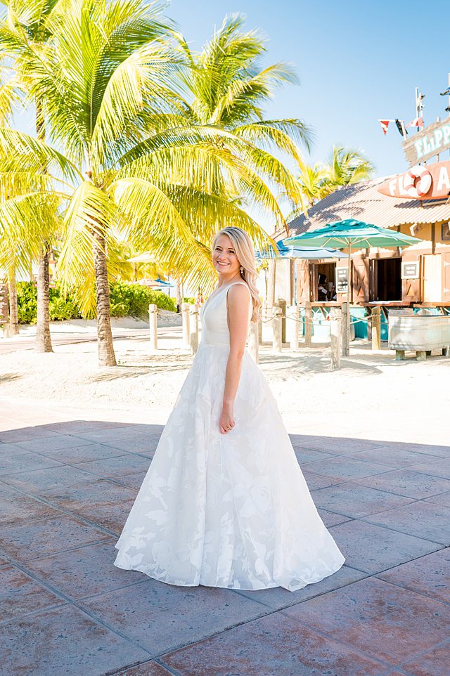 Bride on Castaway Cay for wedding photos by Mikkel Paige Photography.