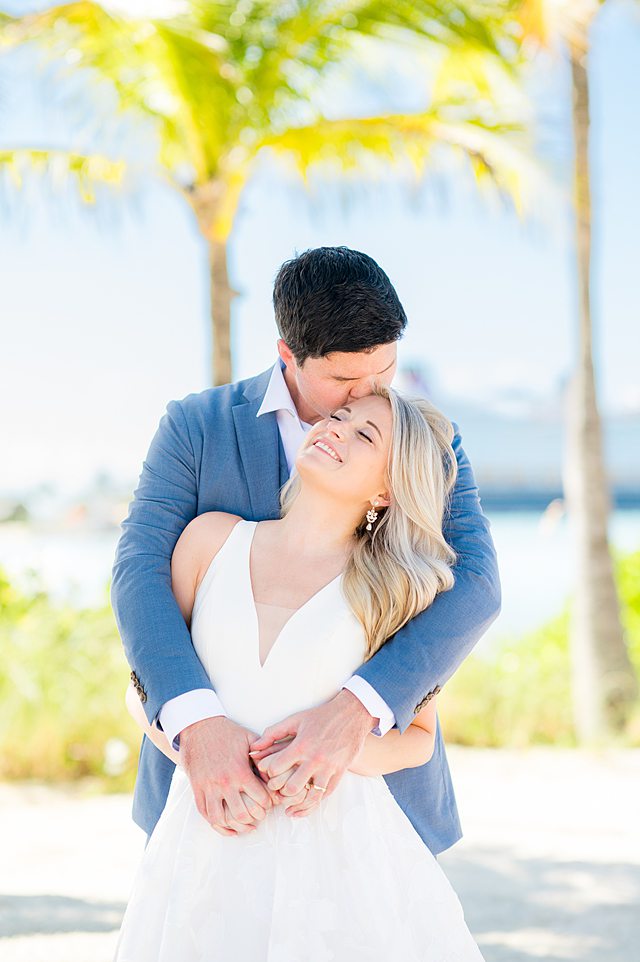 Bride and groom on Castaway Cay for wedding photos by Mikkel Paige Photography.