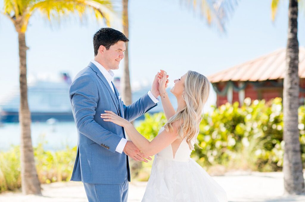 Bride and groom dancing on the beach on Castaway Cay for wedding photos by Mikkel Paige Photography.