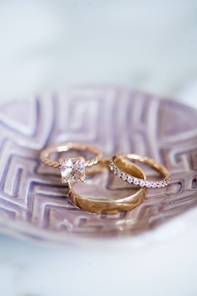 Three rings on a purple ring dish on a Disney Cruise Line wedding. Photos by Mikkel Paige Photography. 