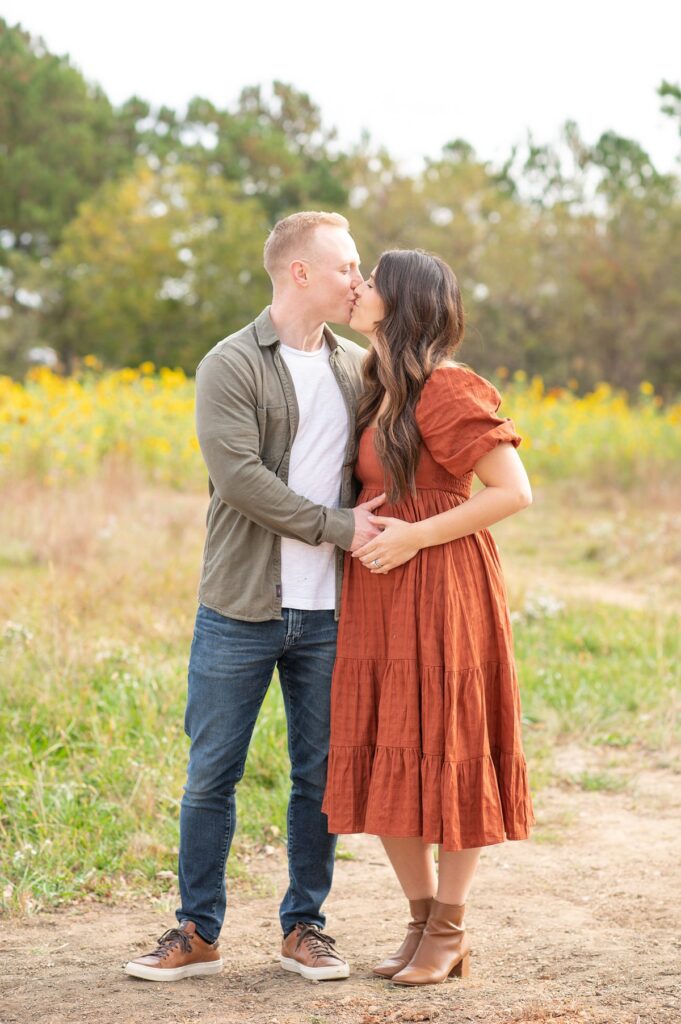 Fall family photo session in the sunflowers at NCMA in Raleigh, NC by Mikkel Paige Photography.