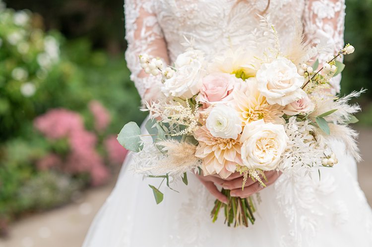 Bouquet with soft colors for a wedding at Blue Hill Stone Barns by Mikkel Paige Photography.