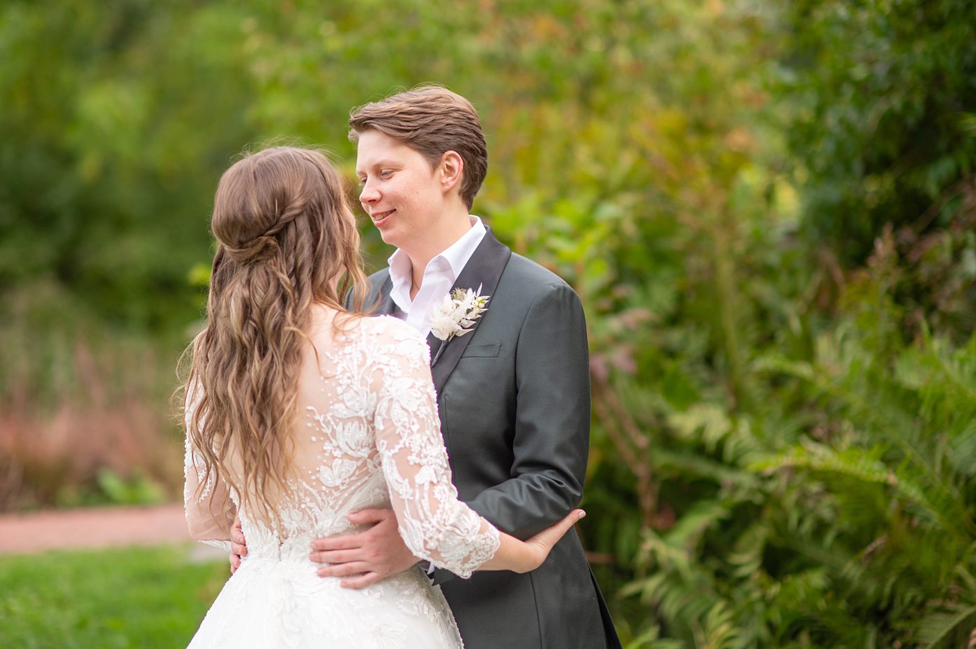 Bride smiling at her bride at a fall wedding at Blue Hill Stone Barns.