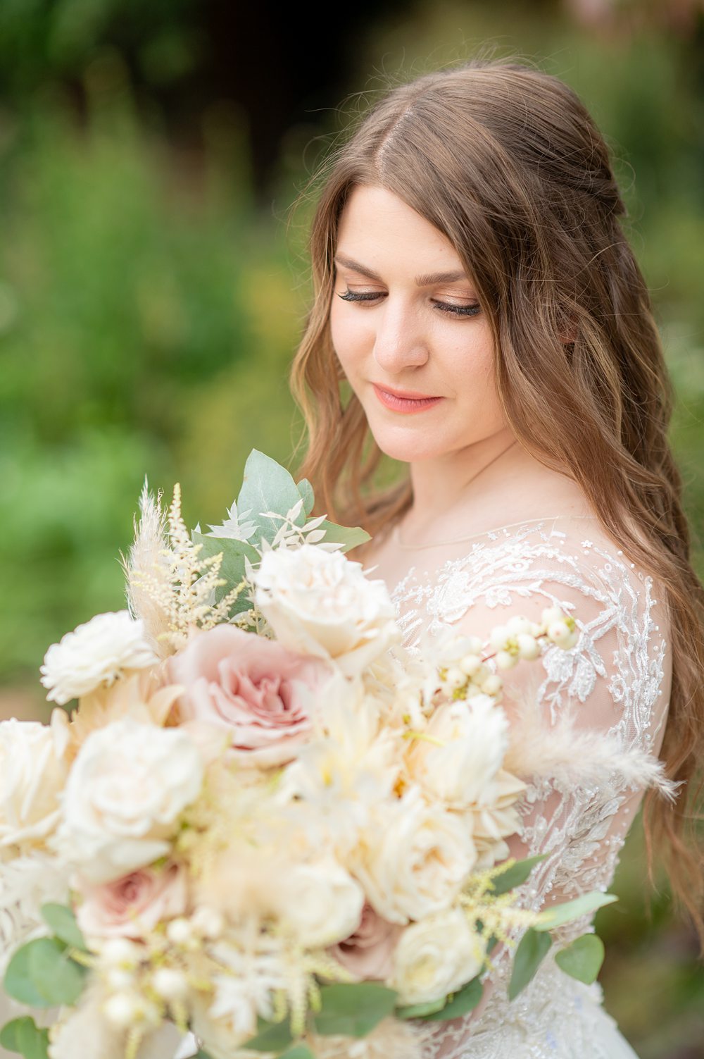Bride with her bouquet at her Blue Hill Stone Barns wedding in New York.