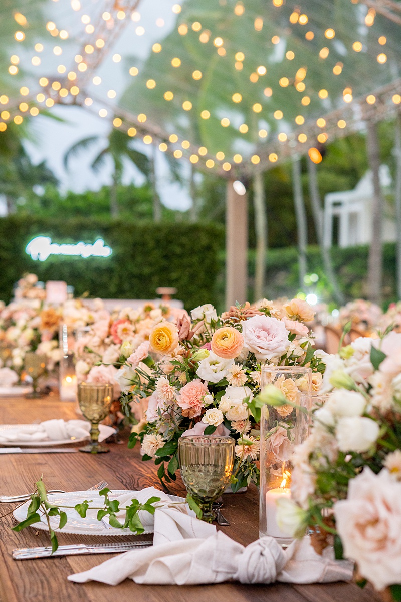 Reception table with fall flowers at Casa de Campo in DR.