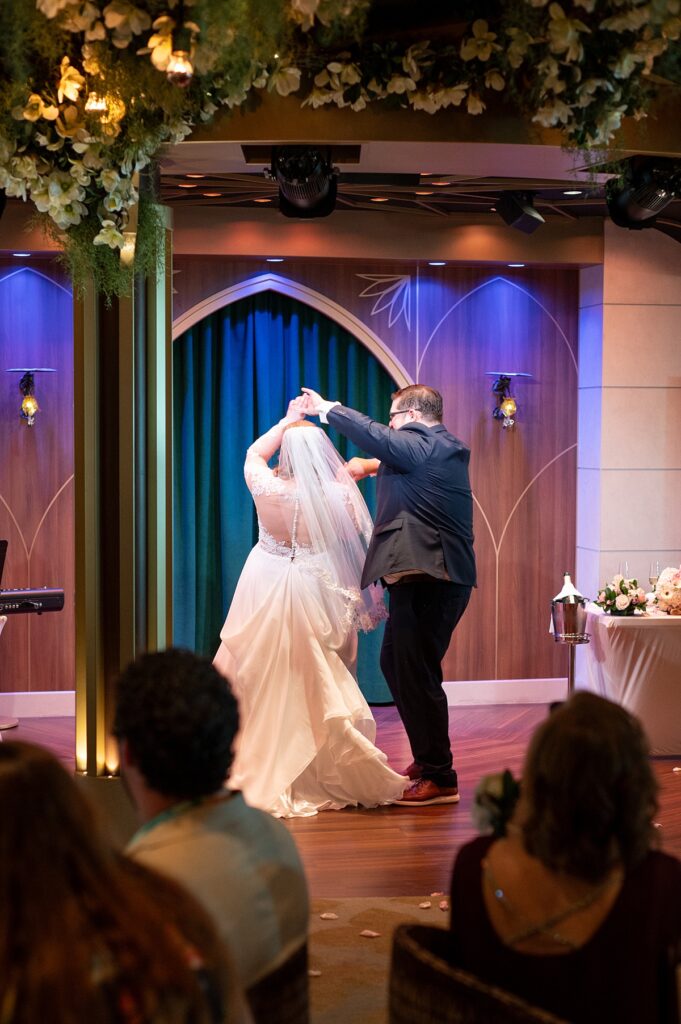 Bride and groom dancing during their wedding at The Bayou on Wish with Disney Cruise Line.