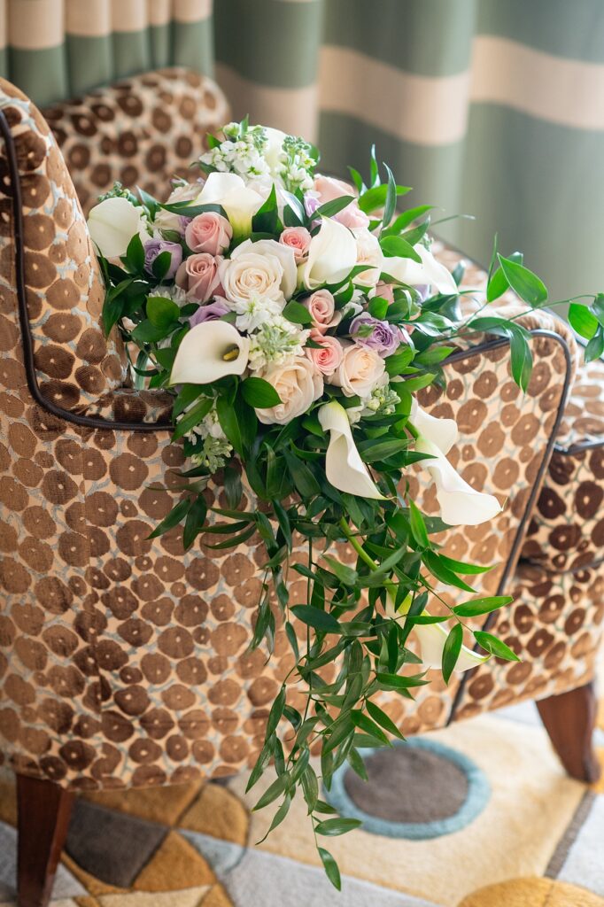 Cascading floral bouquet from a bride on a Disney Cruise Line wedding.