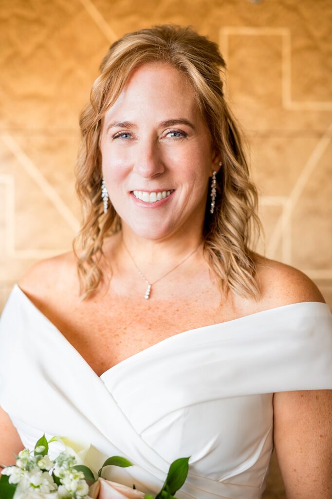 Bride with an off-the-shoulder wedding dress on a Disney Cruise Line wedding.