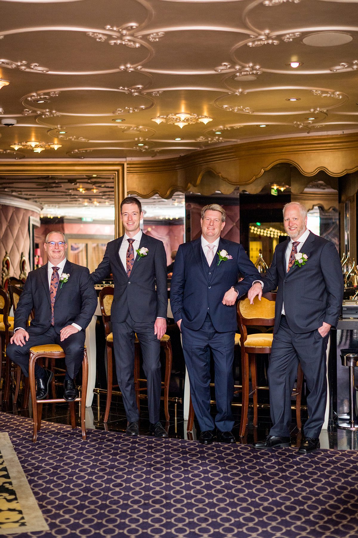 Groomsmen in the Oooh La La champagne bar on Disney Cruise Line Fantasy ship.