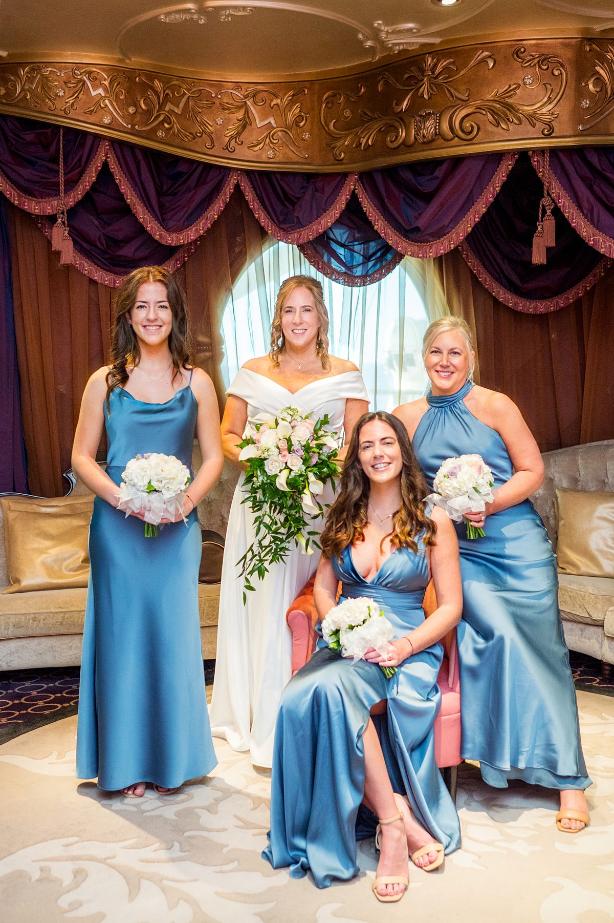 Bridal party in Ooh La La champagne bar on Disney Fantasy cruise ship.